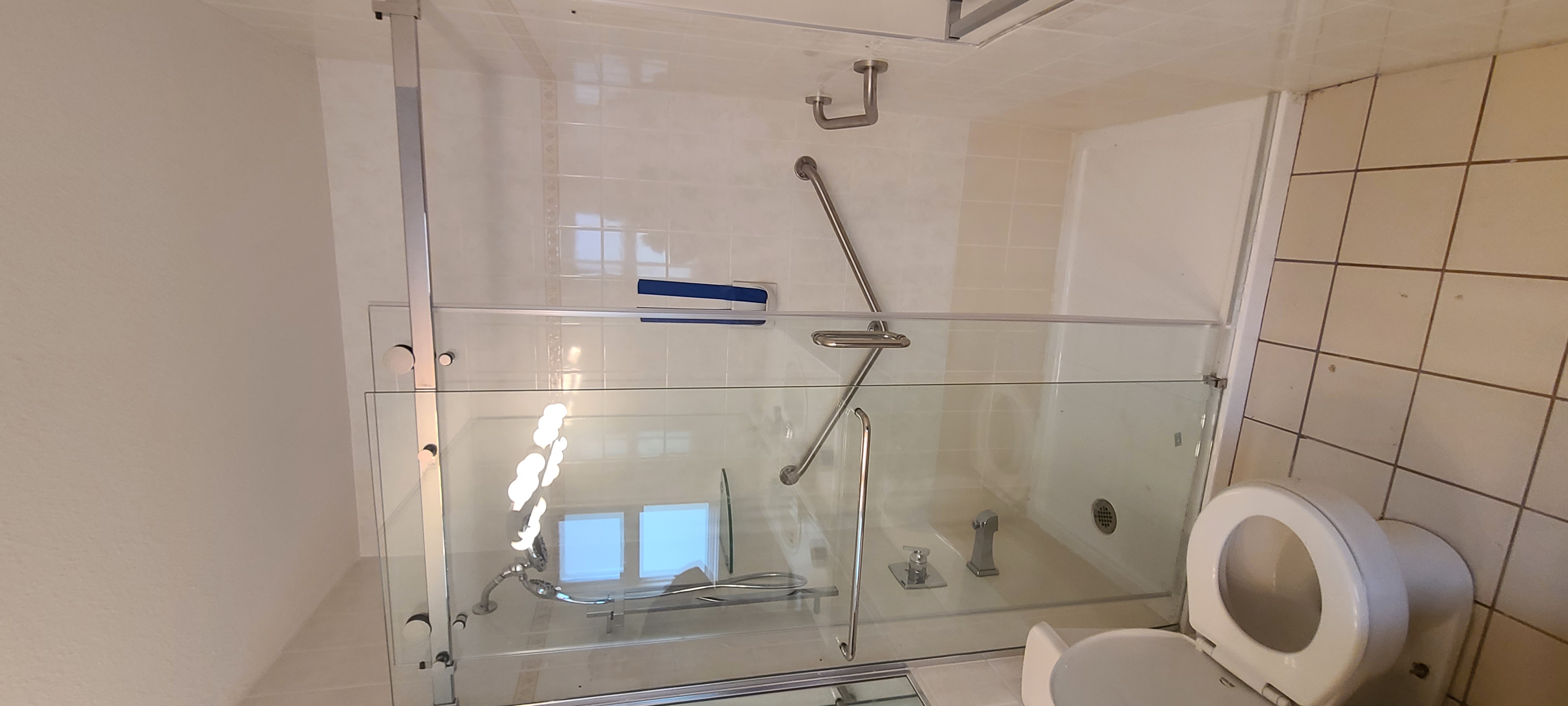 Residential tub to shower conversion